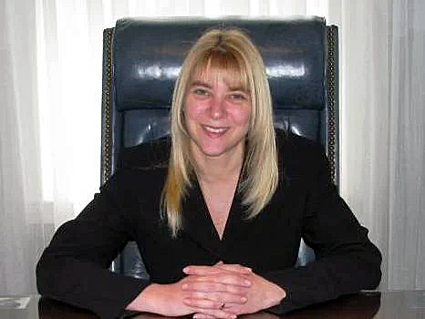 Lisa Jordan attorney reviewing legal documents for Massachusetts clients